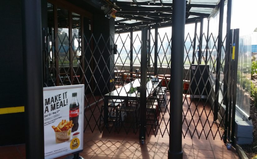 PORTABLE BARRIER SHOP CLOSURE DOORS SECURE GUZMAN Y GOMEZ RESTAURANTS