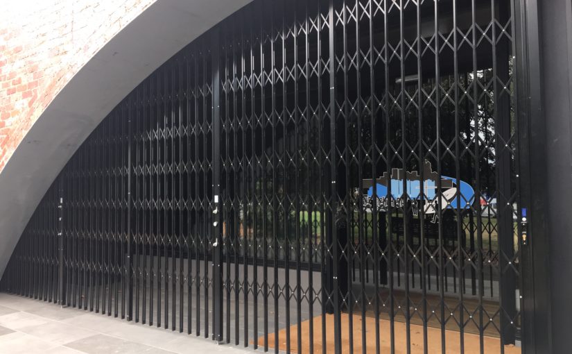 HIGH QUALITY CURVED STEEL RETRACTABLE SECURITY DOOR FOR BAPTIST CHURCH FITOUT