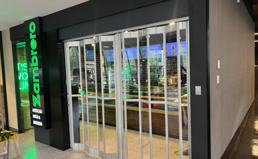 Premium grade commercial folding closure doors complement quality corporate brands